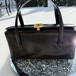Gucci Black Leather Shoulder Bag with Gold Clasp